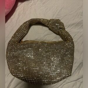 Madison west sparkle gold dumpling evening bag